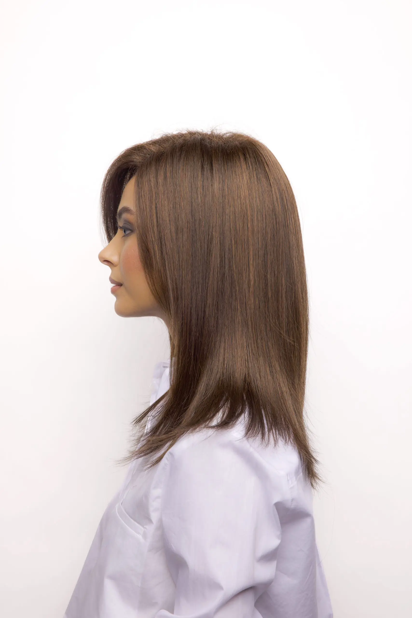 Profile view of woman with smooth hair